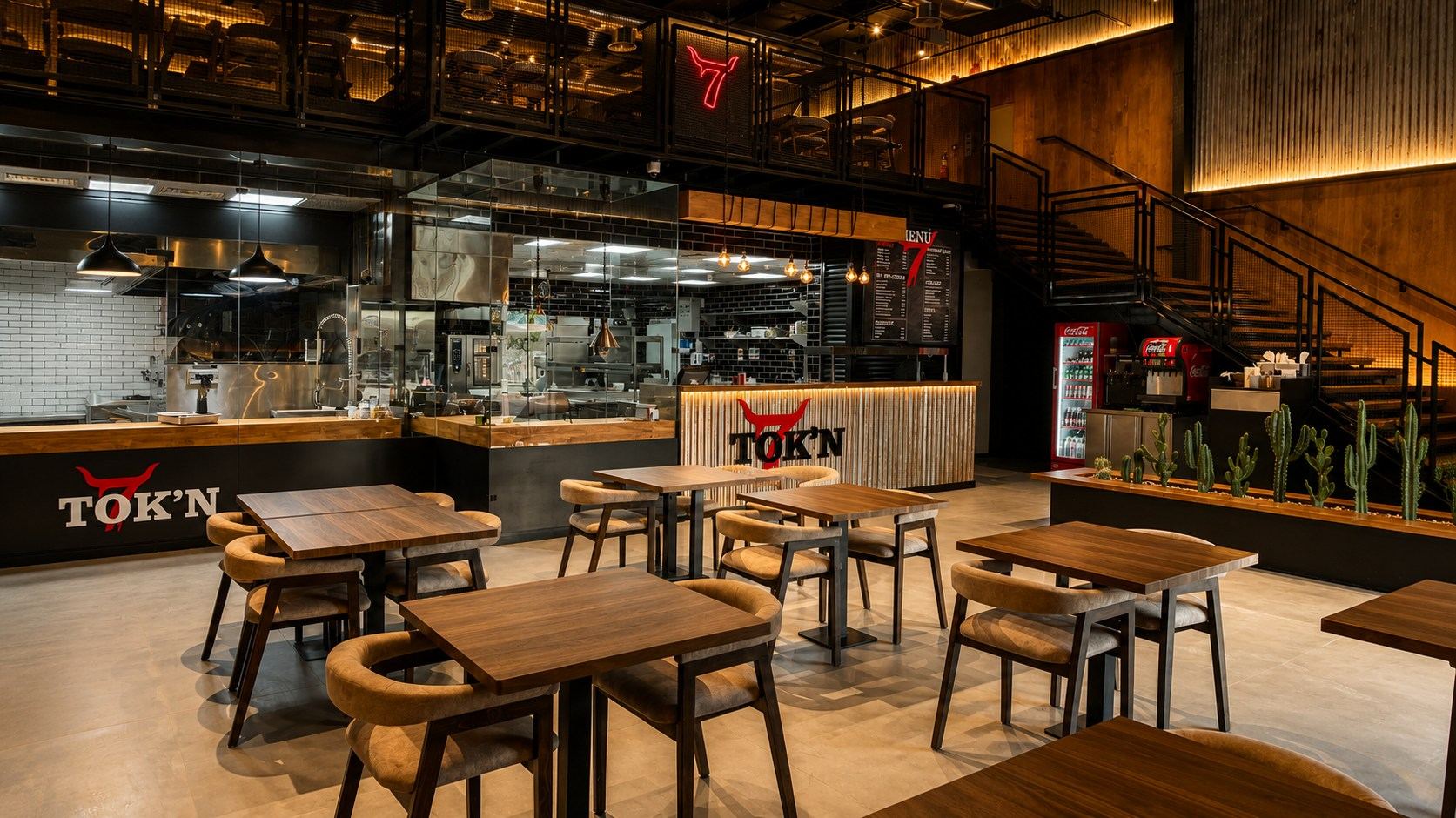 Smok'N7 restaurant dining hall with open kitchen